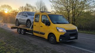Laweta z SUV-em o wschodzie słońca – Piła